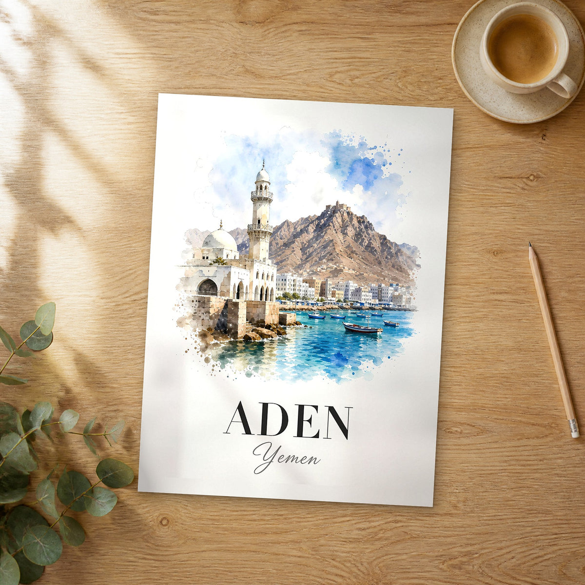 Unframed Aden watercolor travel poster on a wooden table