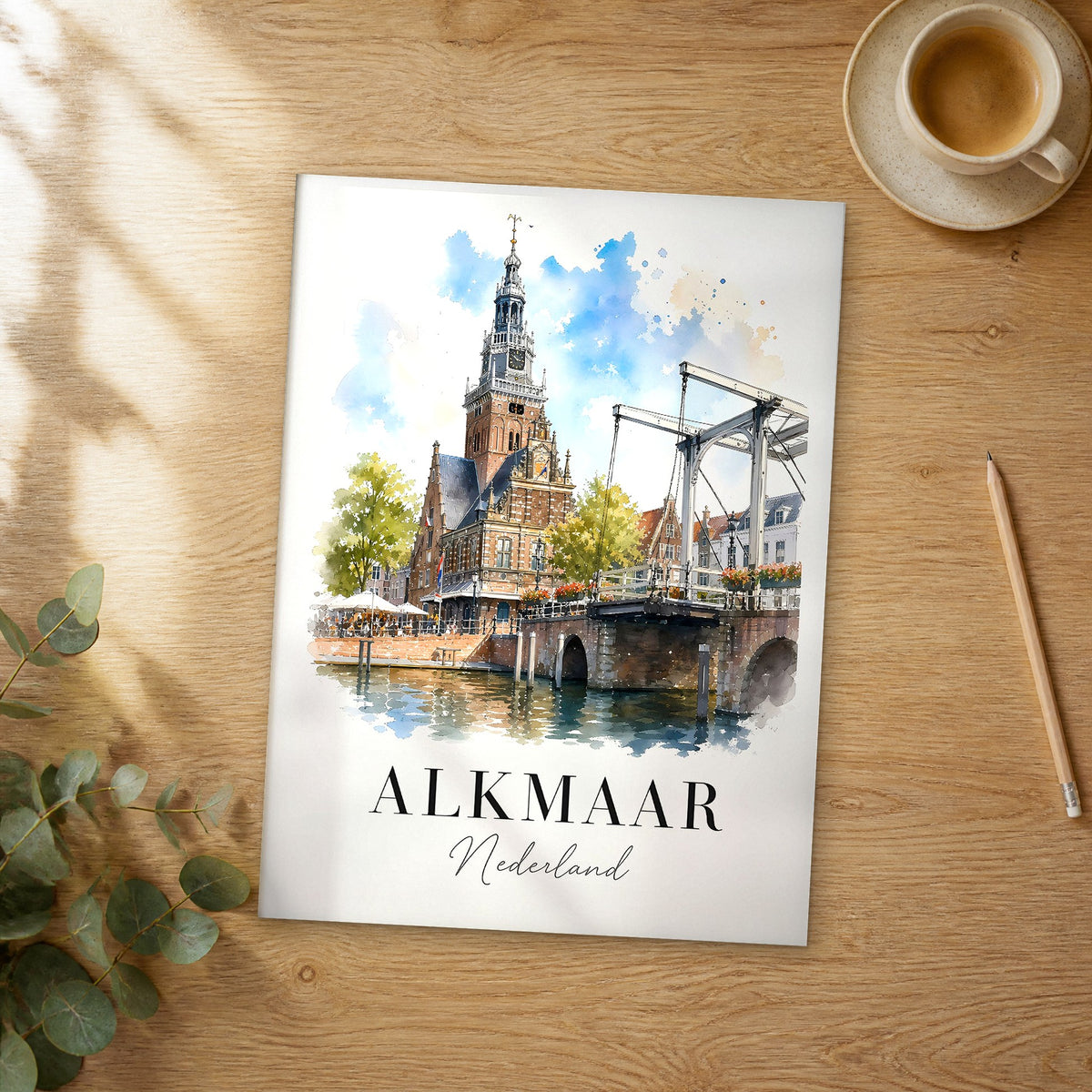 Unframed Alkmaar watercolor travel poster on a wooden table