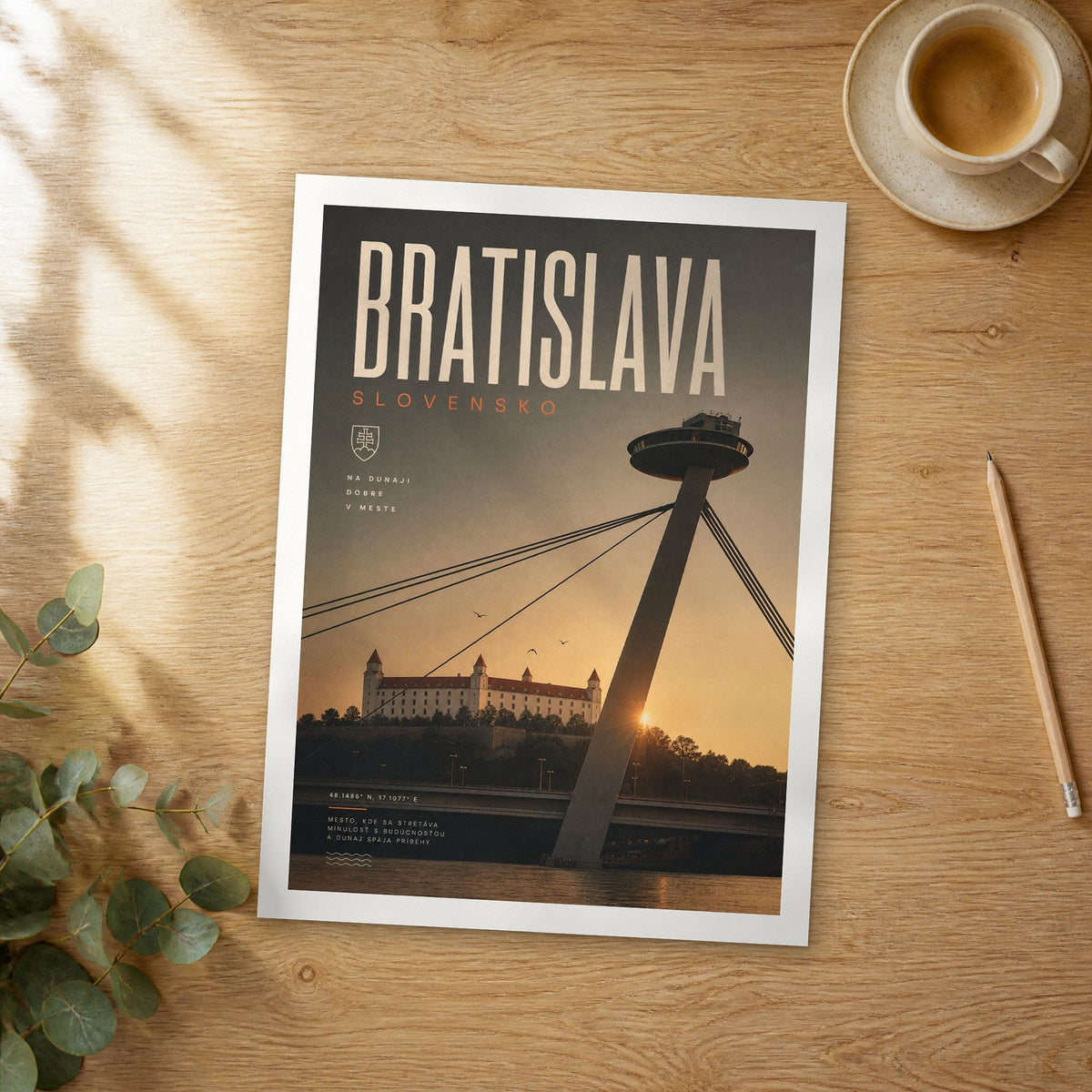 Unframed Bratislava bold typography travel poster on a wooden table