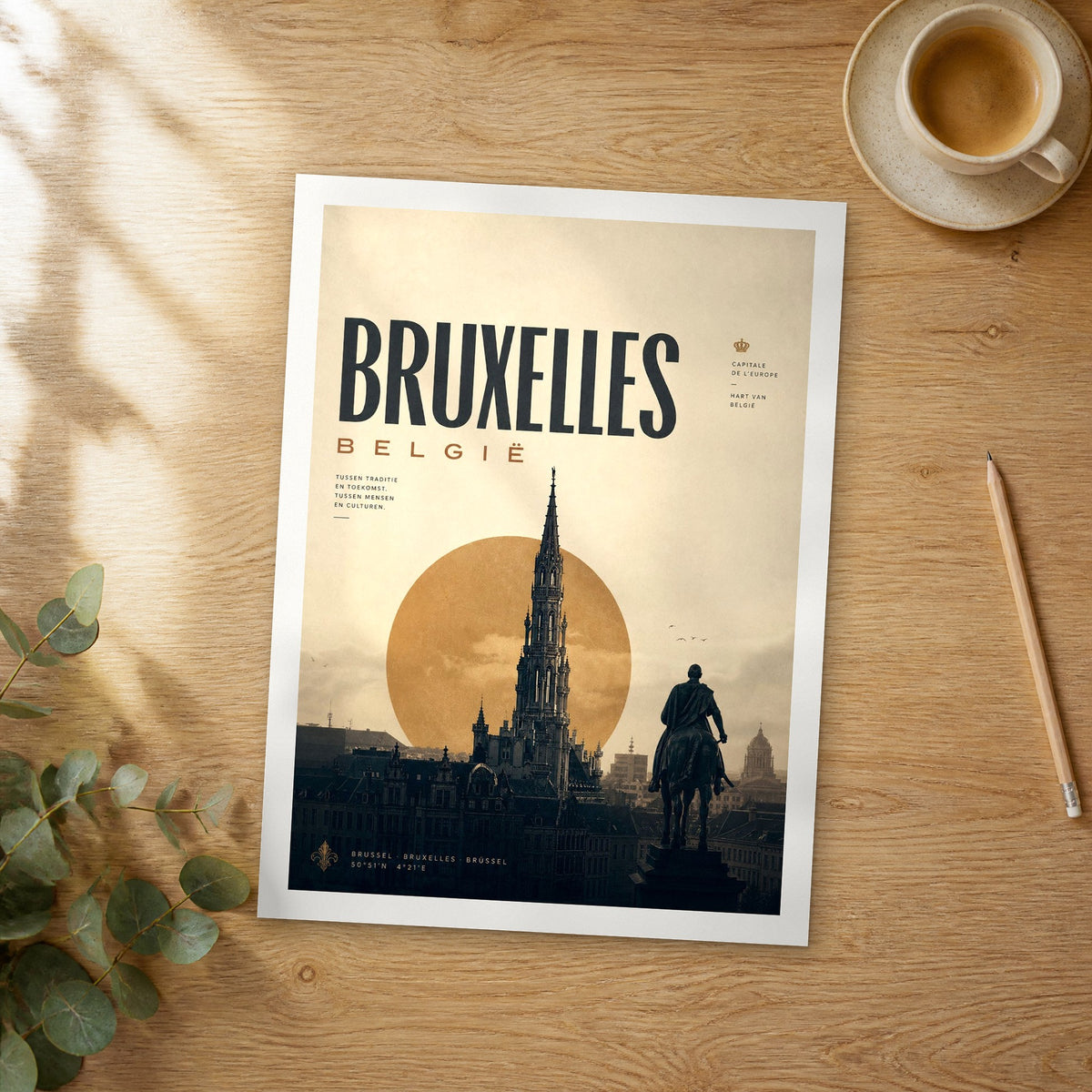 Unframed Bruxelles Town Hall Spire at Sunset bold typography travel poster on a wooden table