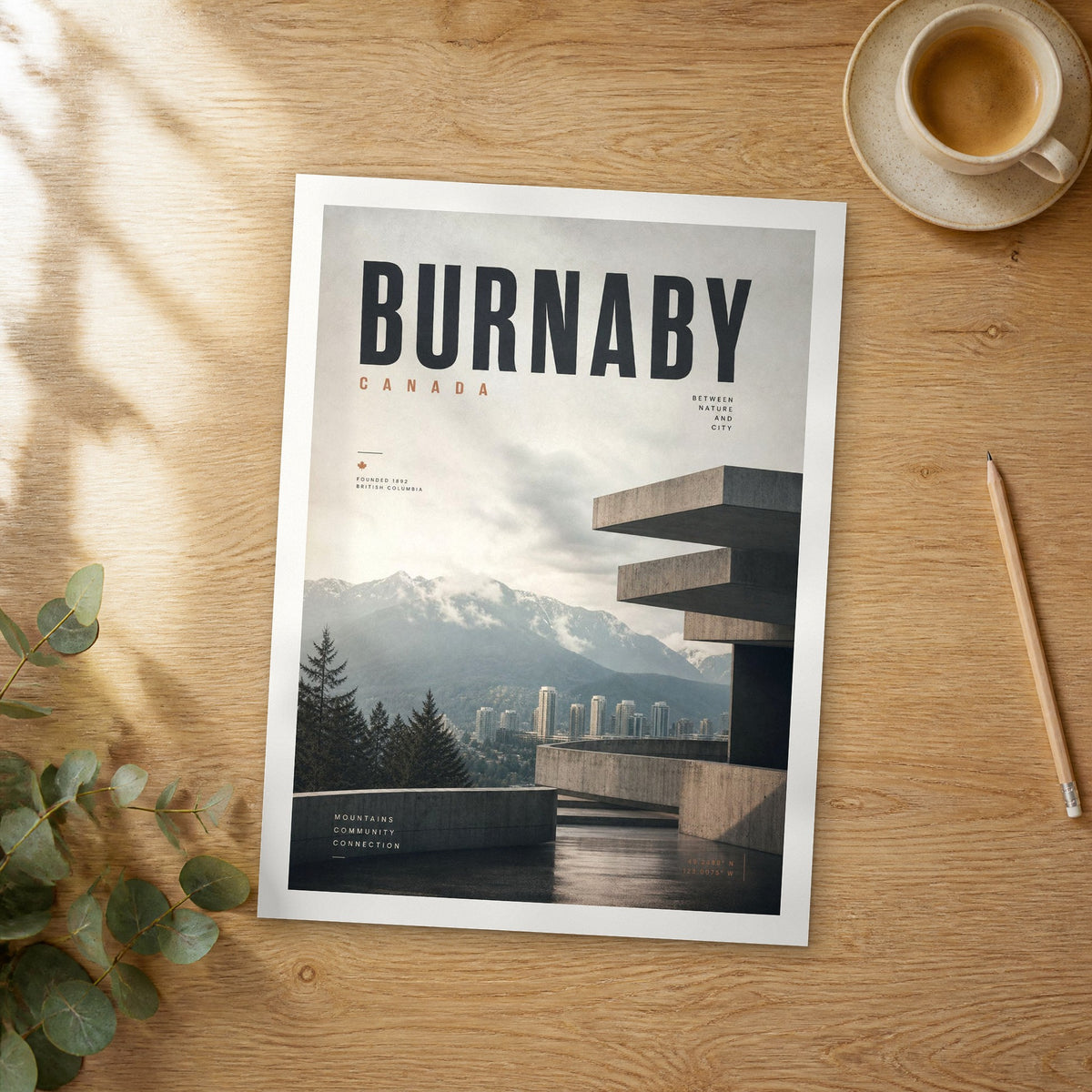 Unframed Burnaby bold typography travel poster on a wooden table