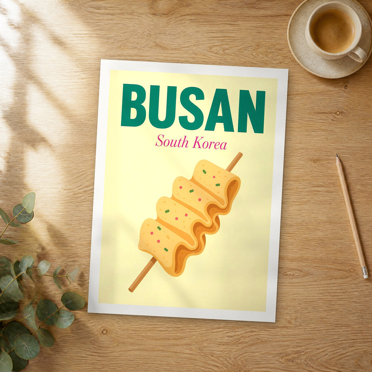 Unframed Busan pop art travel poster on a wooden table