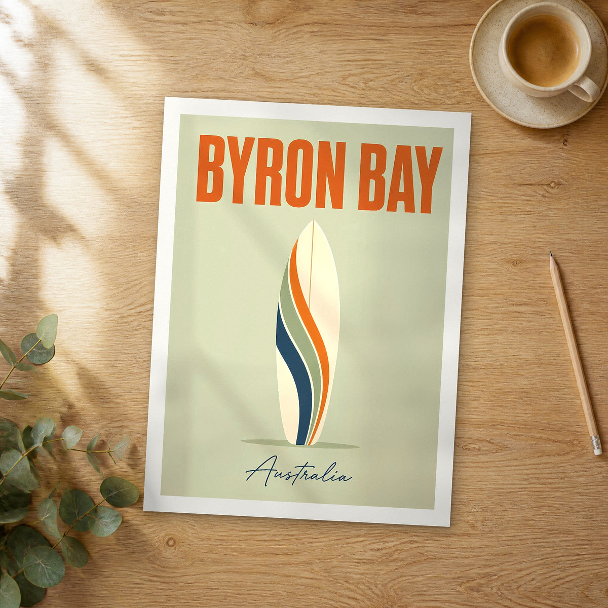 Unframed Byron Bay pop art travel poster on a wooden table