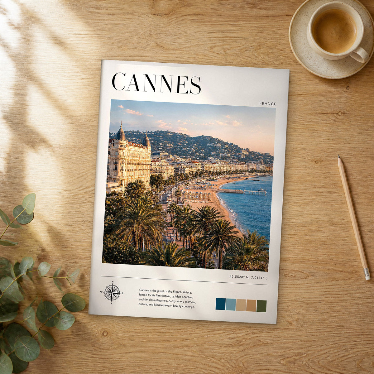 Unframed Cannes modern photography travel poster on a wooden table
