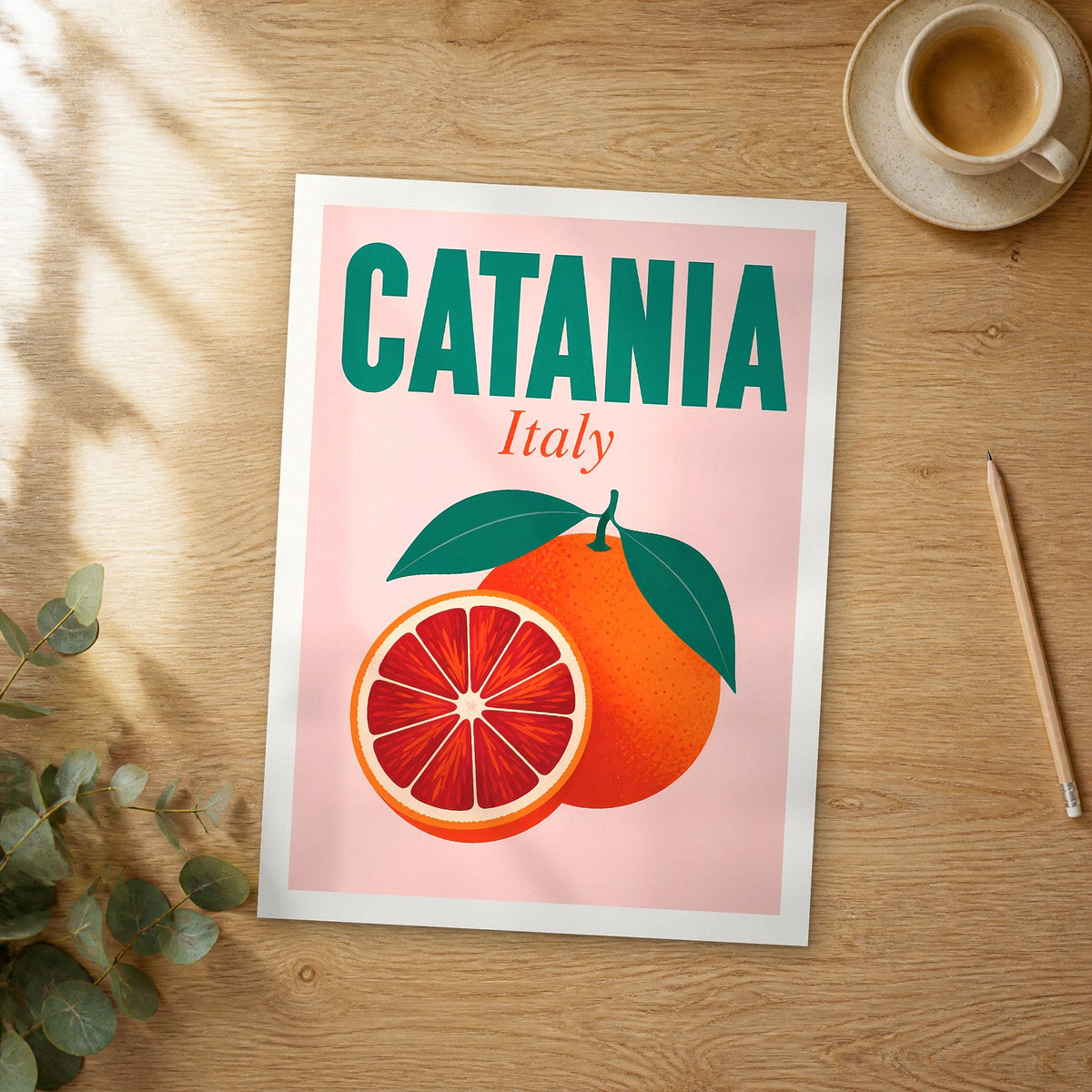 Unframed Catania pop art travel poster on a wooden table
