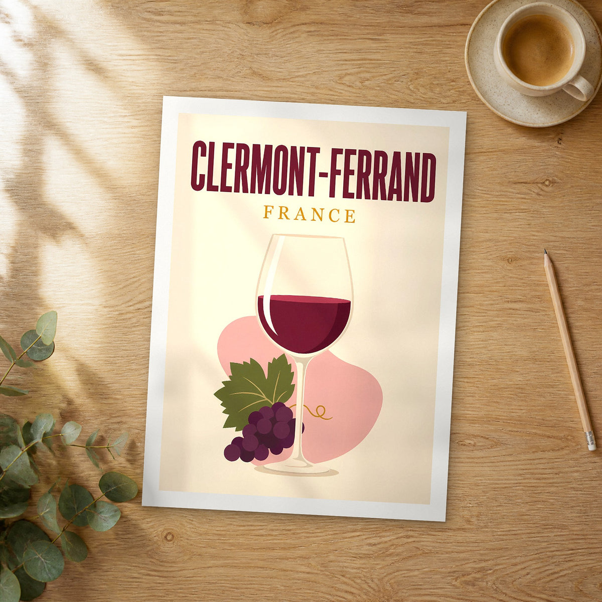 Unframed Clermont-Ferrand pop art travel poster on a wooden table