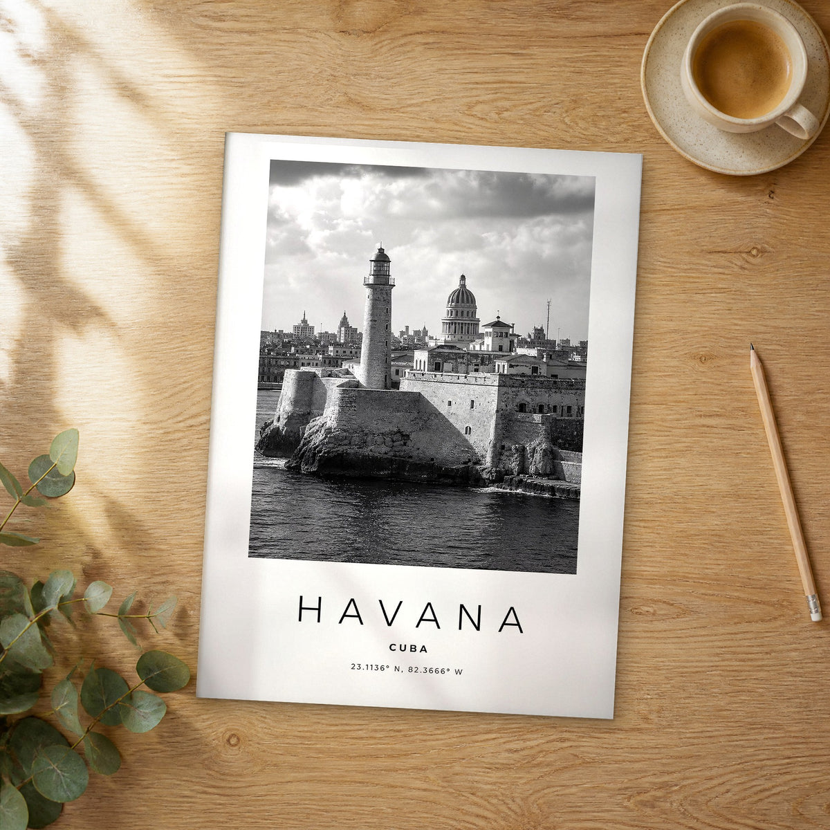 Unframed Havana black and white travel poster on a wooden table