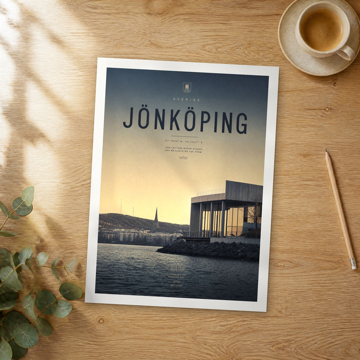 Unframed Jönköping bold typography travel poster on a wooden table