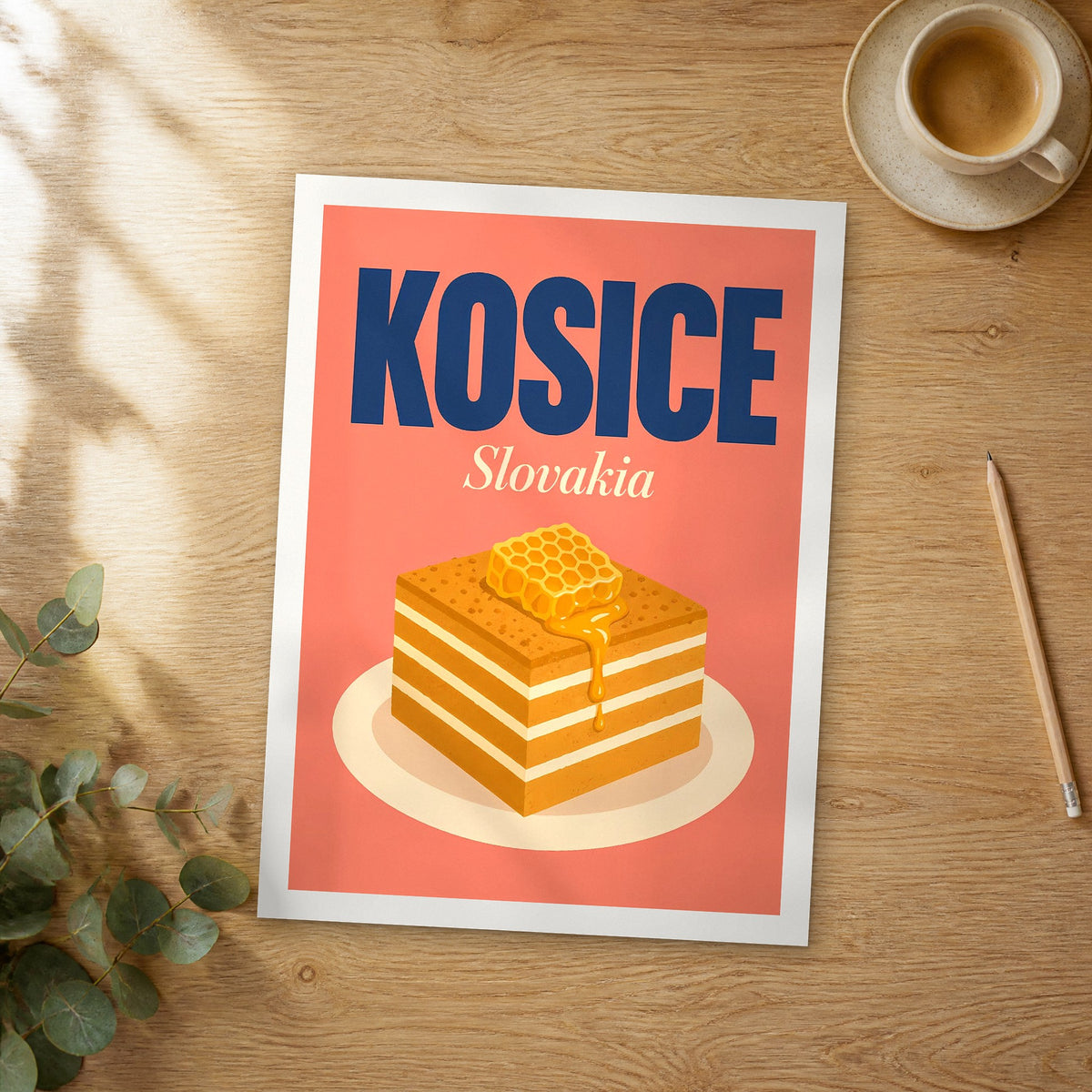 Unframed Kosice pop art travel poster on a wooden table