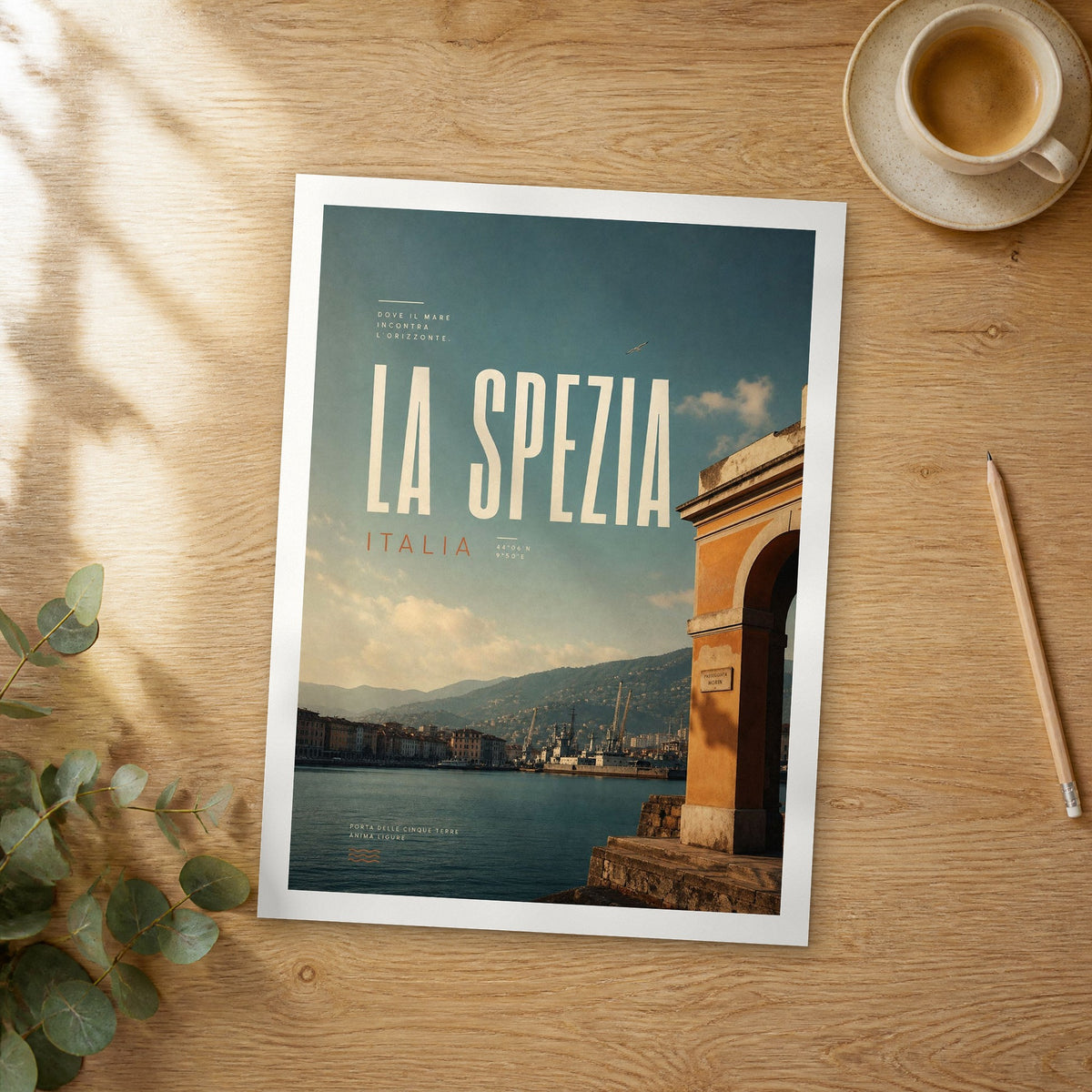 Unframed La Spezia bold typography travel poster on a wooden table