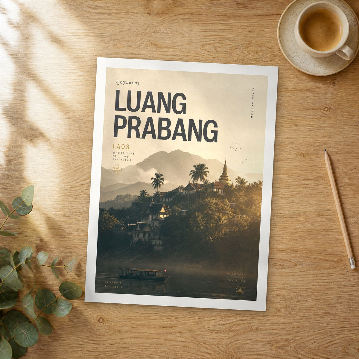 Unframed Luang Prabang bold typography travel poster on a wooden table