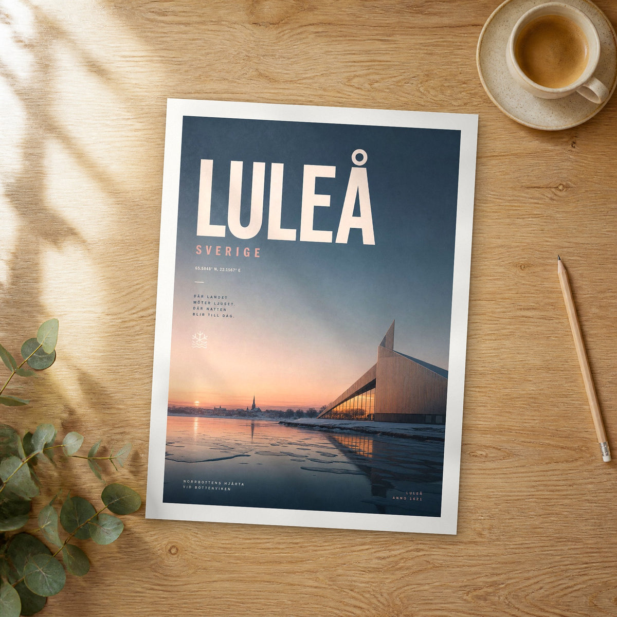 Unframed Luleå bold typography travel poster on a wooden table