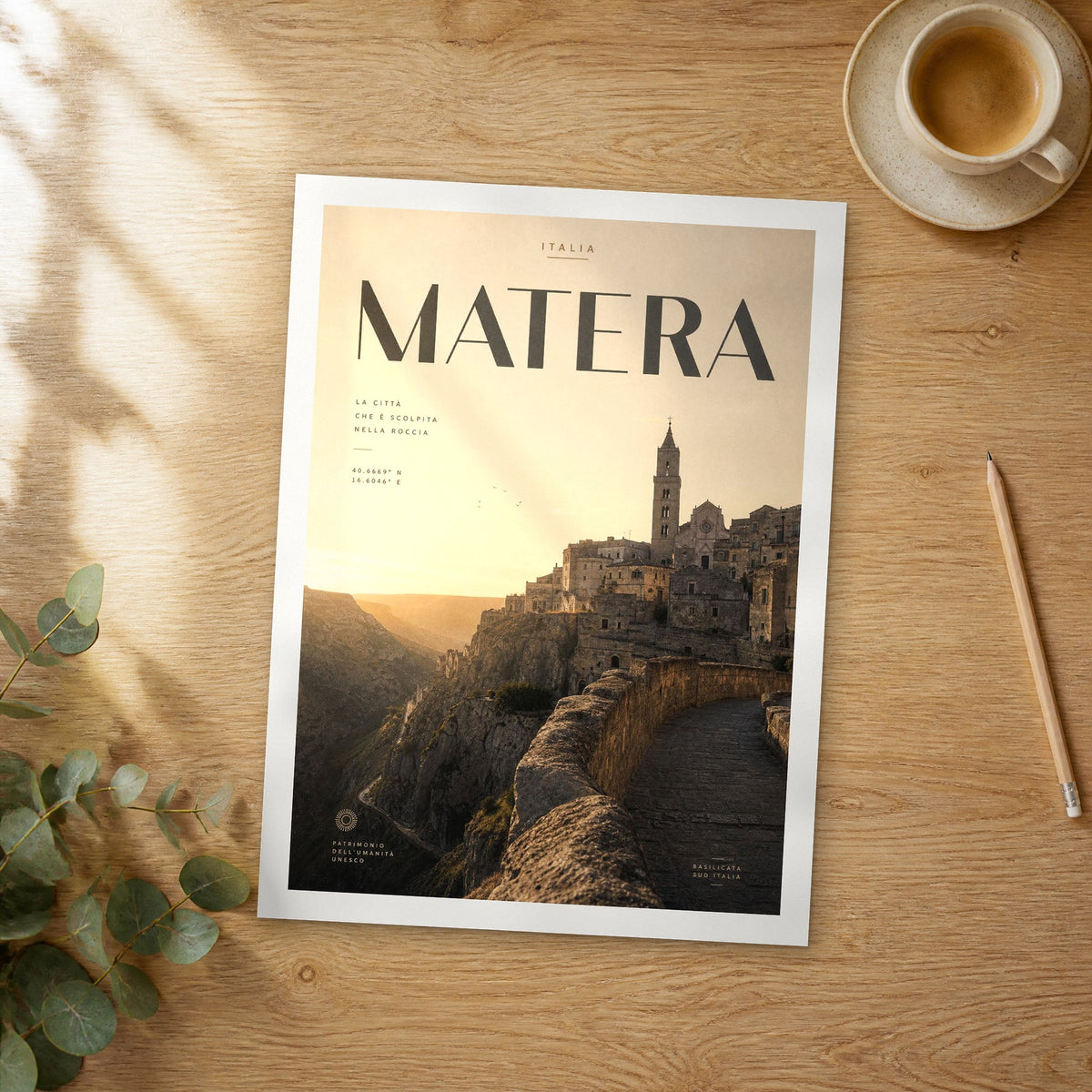 Unframed Matera bold typography travel poster on a wooden table
