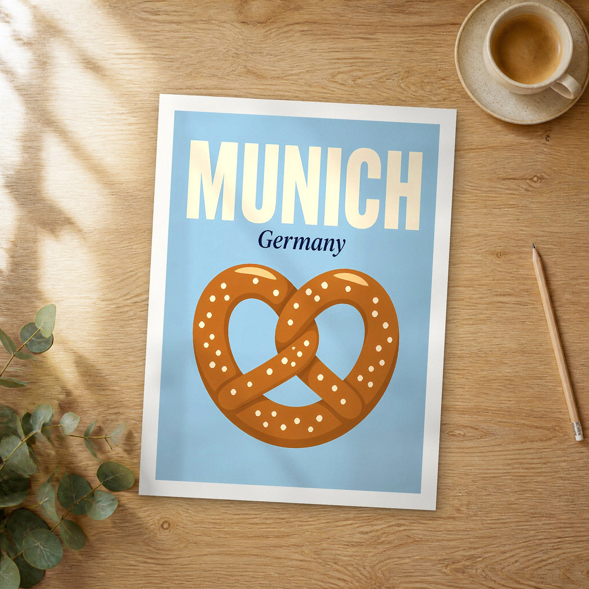 Unframed Munich pop art travel poster on a wooden table