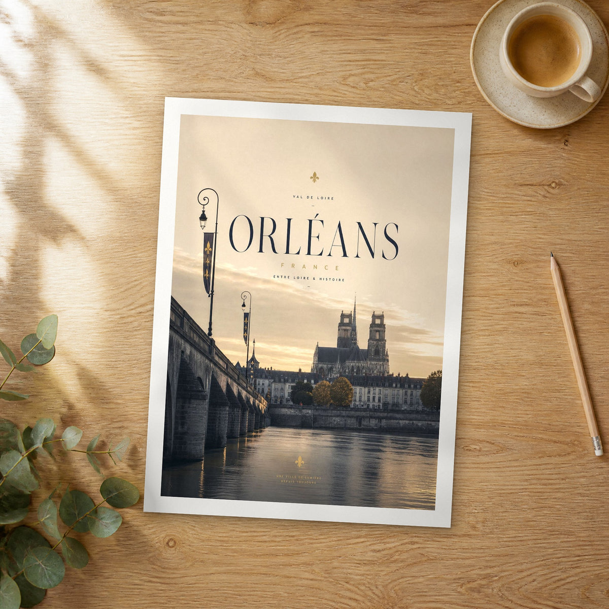 Unframed Orléans bold typography travel poster on a wooden table