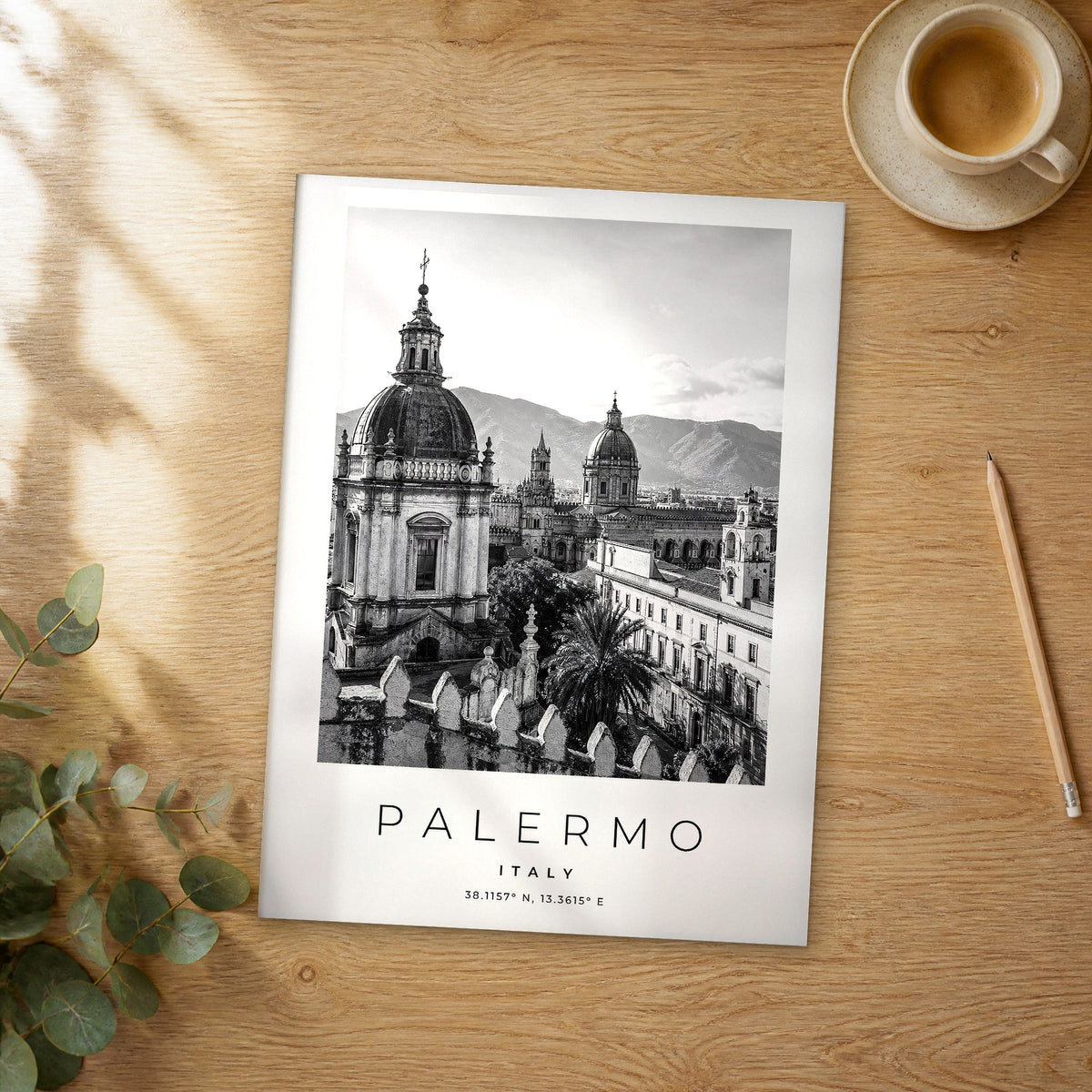 Unframed Palermo black and white travel poster on a wooden table