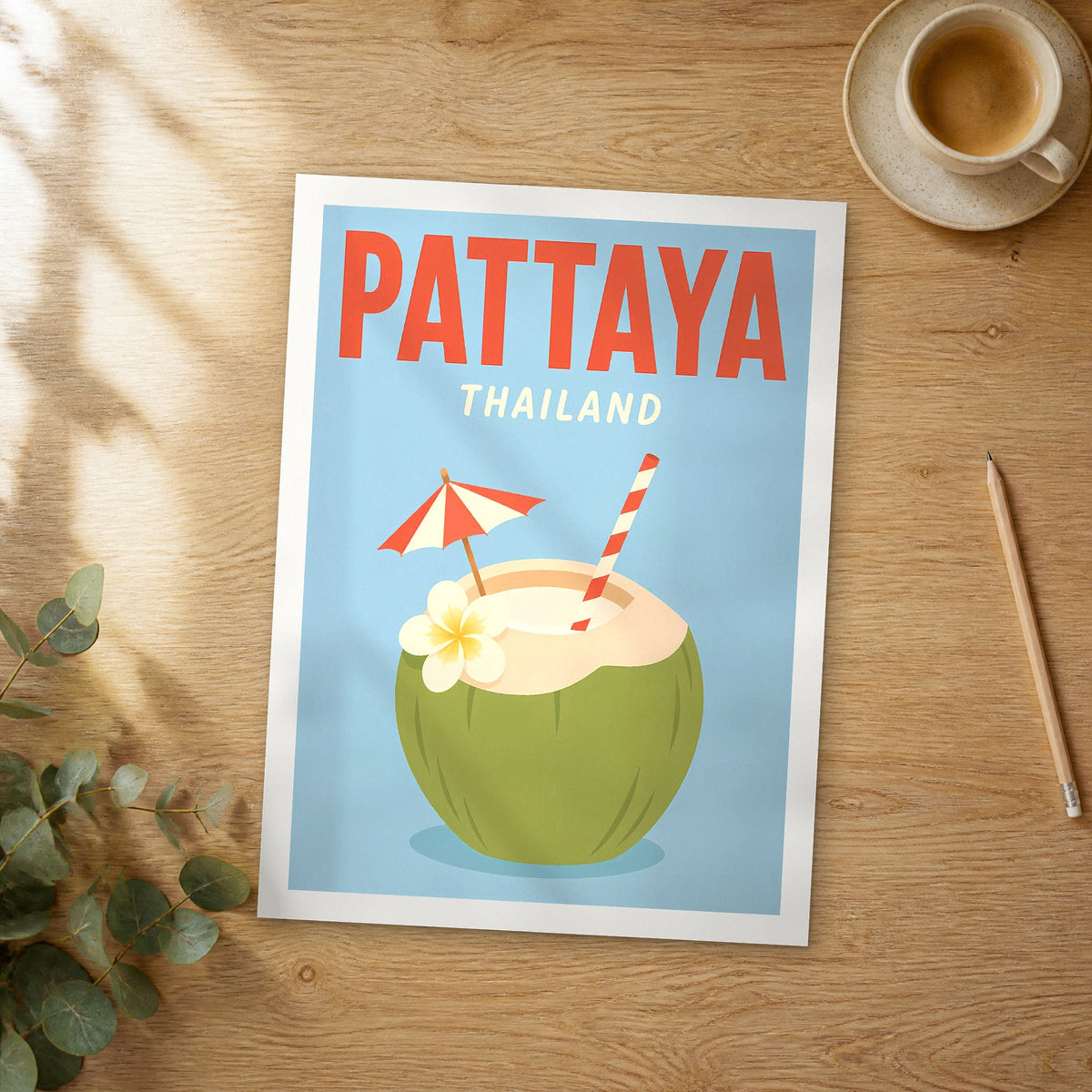 Unframed Pattaya pop art travel poster on a wooden table