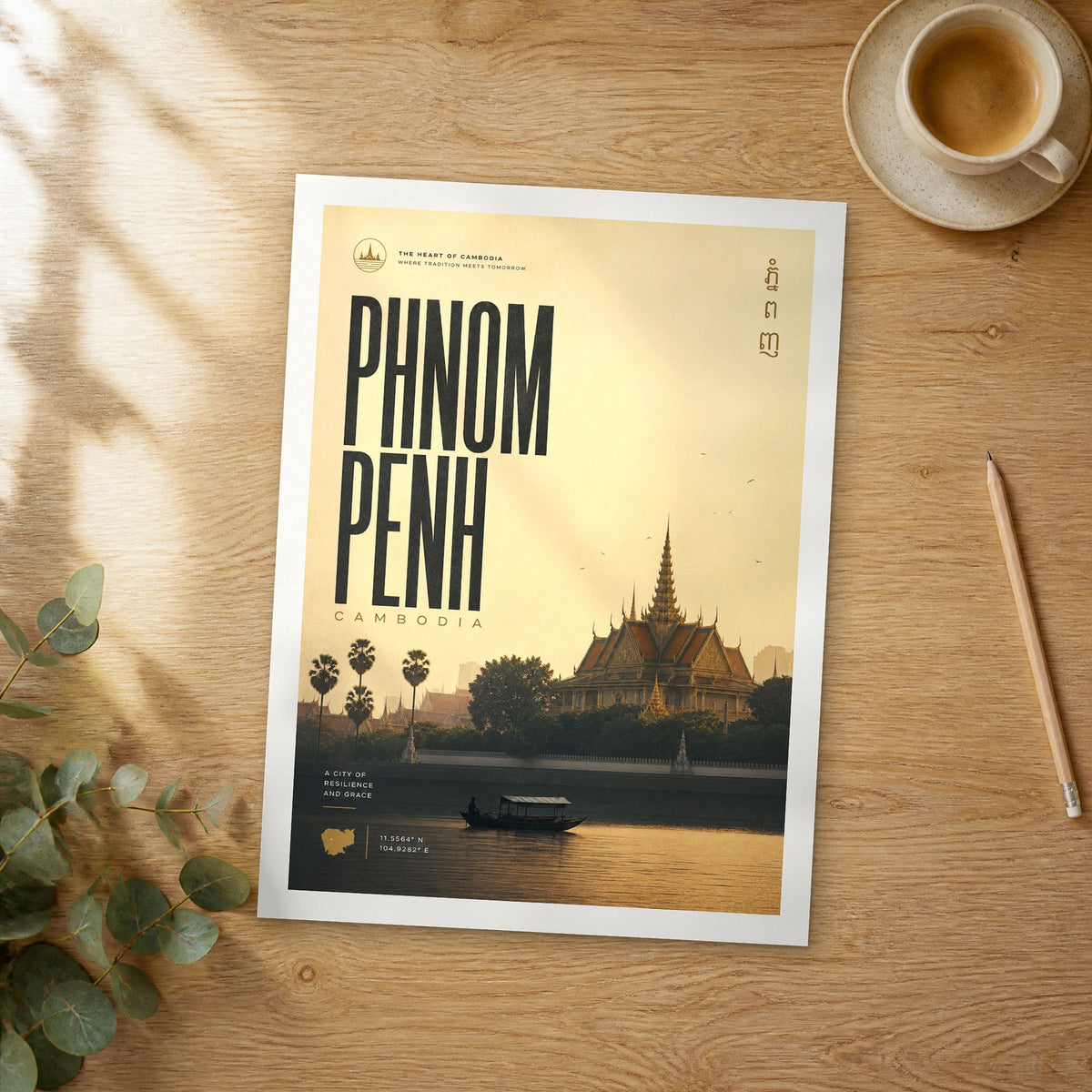 Unframed Phnom Penh bold typography travel poster on a wooden table