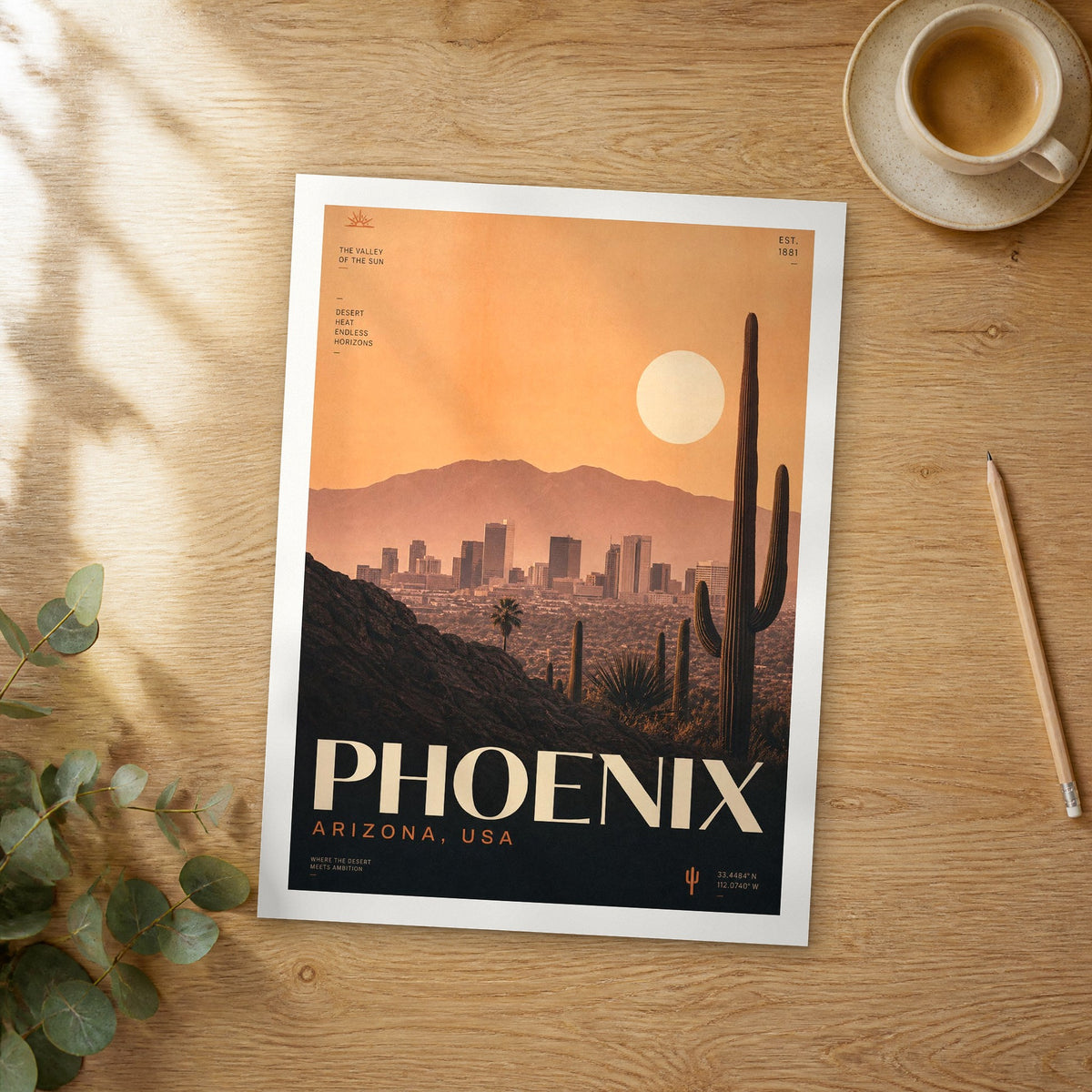 Unframed Phoenix Saguaro Skyline at Dusk bold typography travel poster on a wooden table