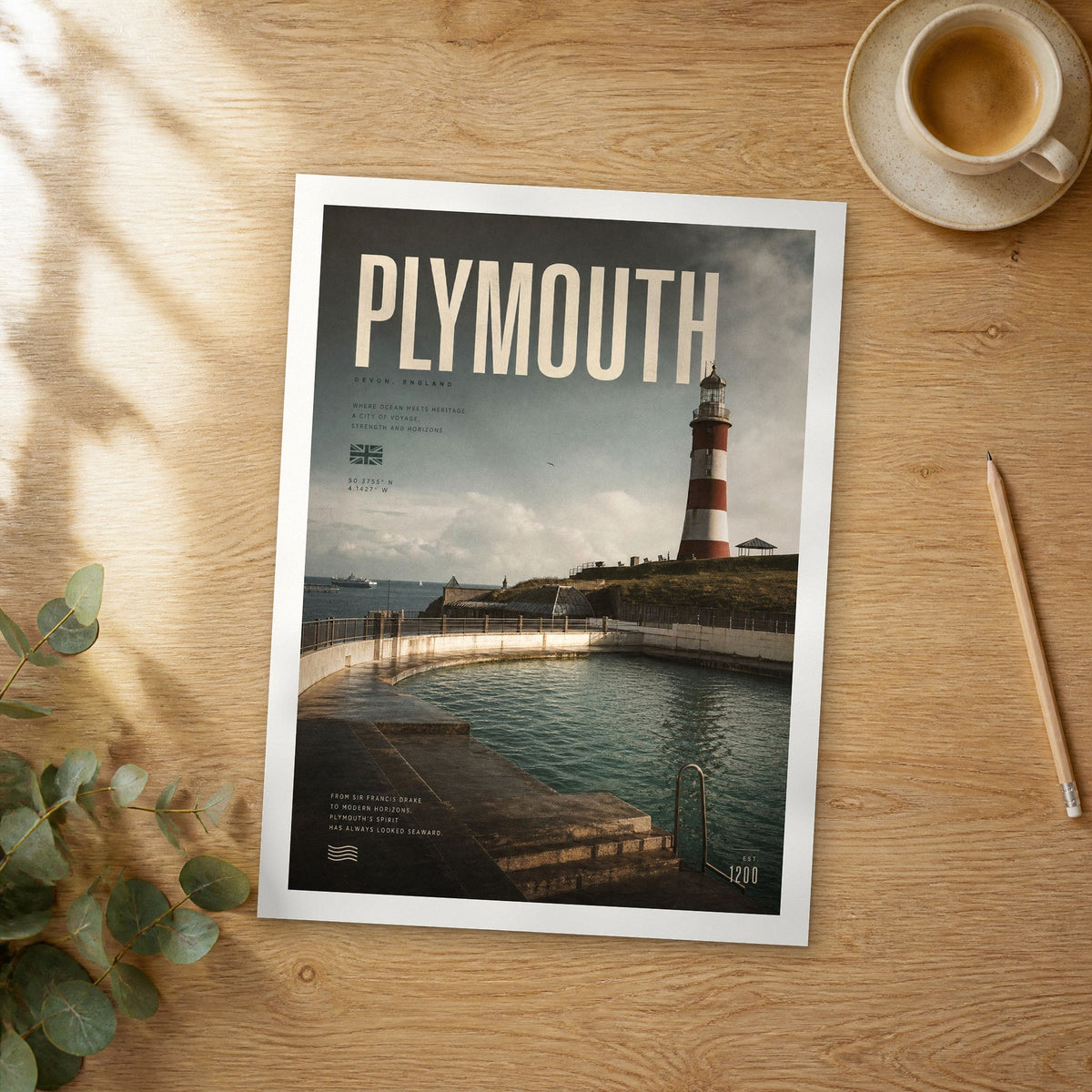 Unframed Plymouth bold typography travel poster on a wooden table
