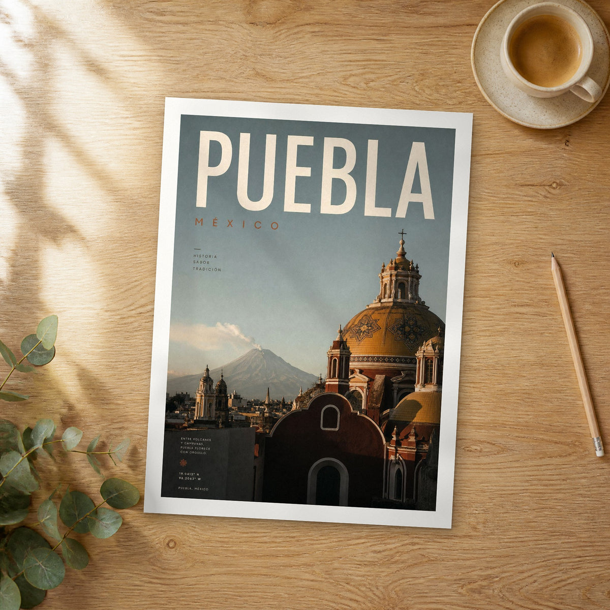 Unframed Puebla bold typography travel poster on a wooden table