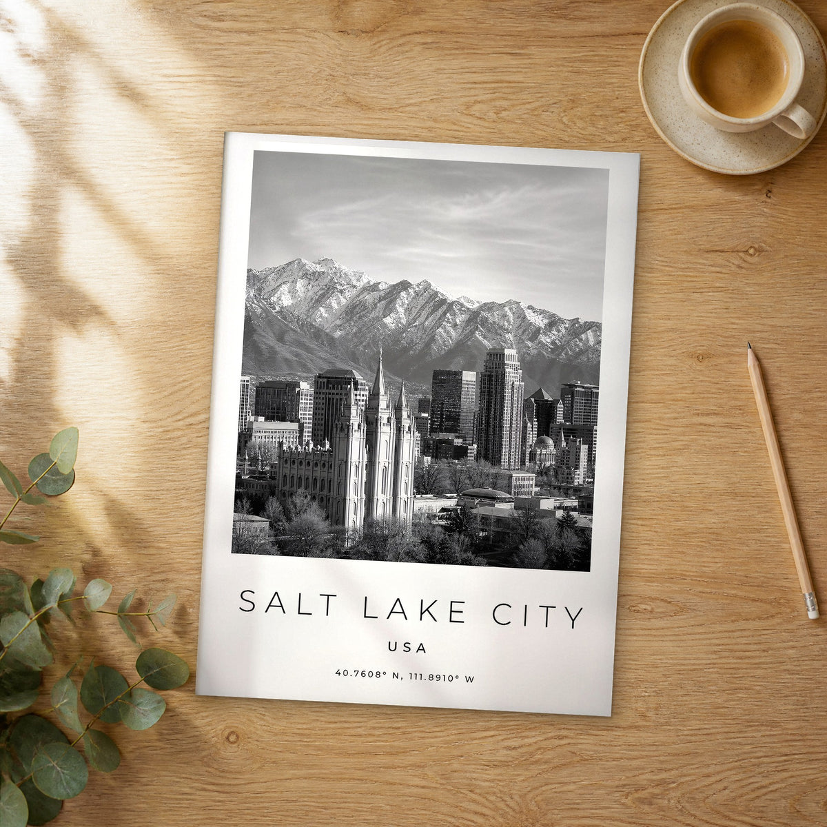 Unframed Salt Lake City black and white travel poster on a wooden table