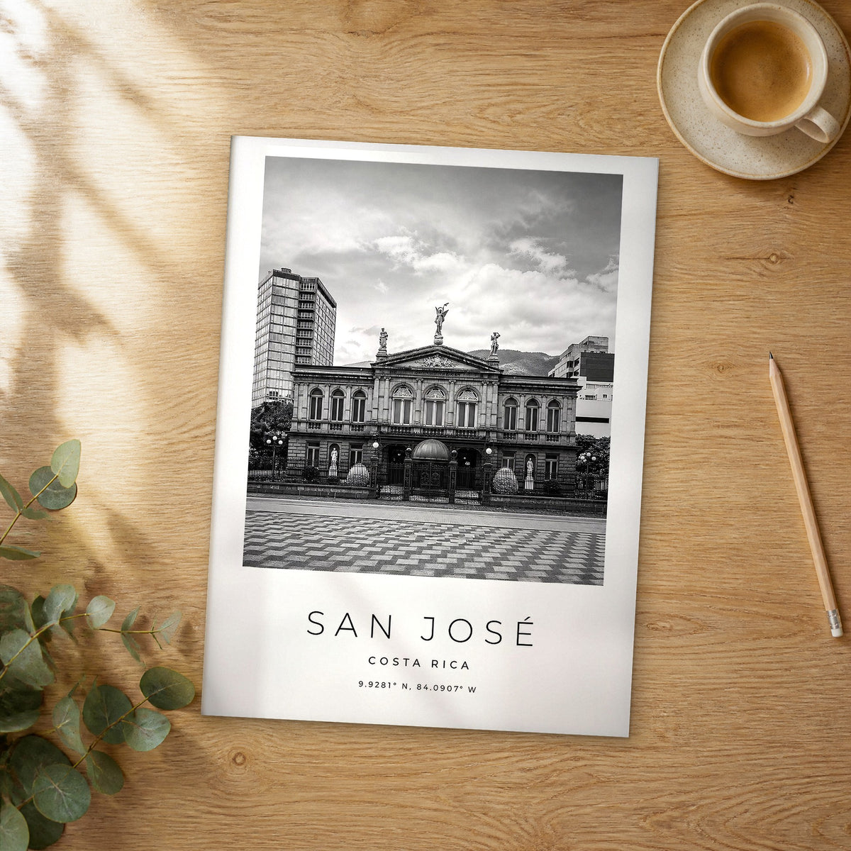 Unframed San José black and white travel poster on a wooden table