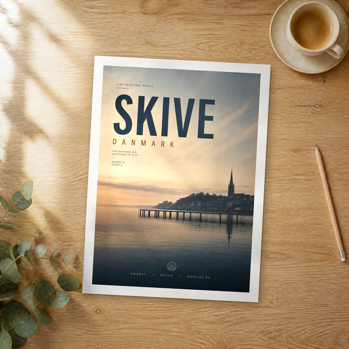 Unframed Skive bold typography travel poster on a wooden table