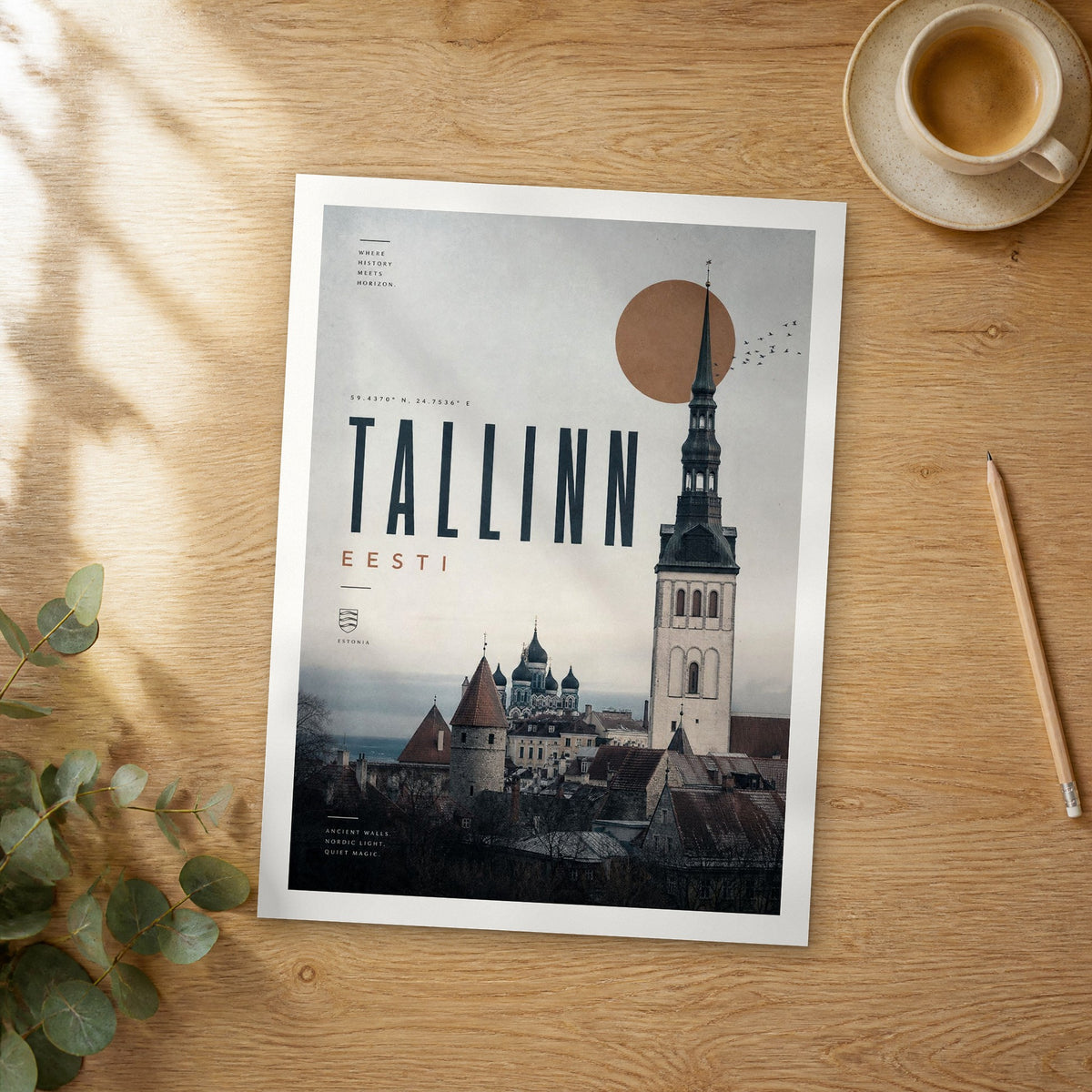 Unframed Tallinn bold typography travel poster on a wooden table