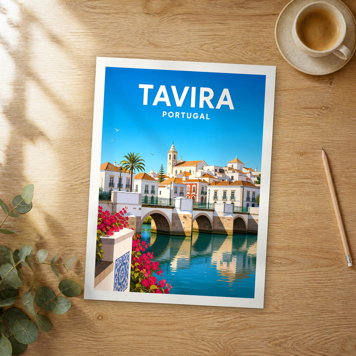 Unframed Tavira vibrant digital travel poster on a wooden table
