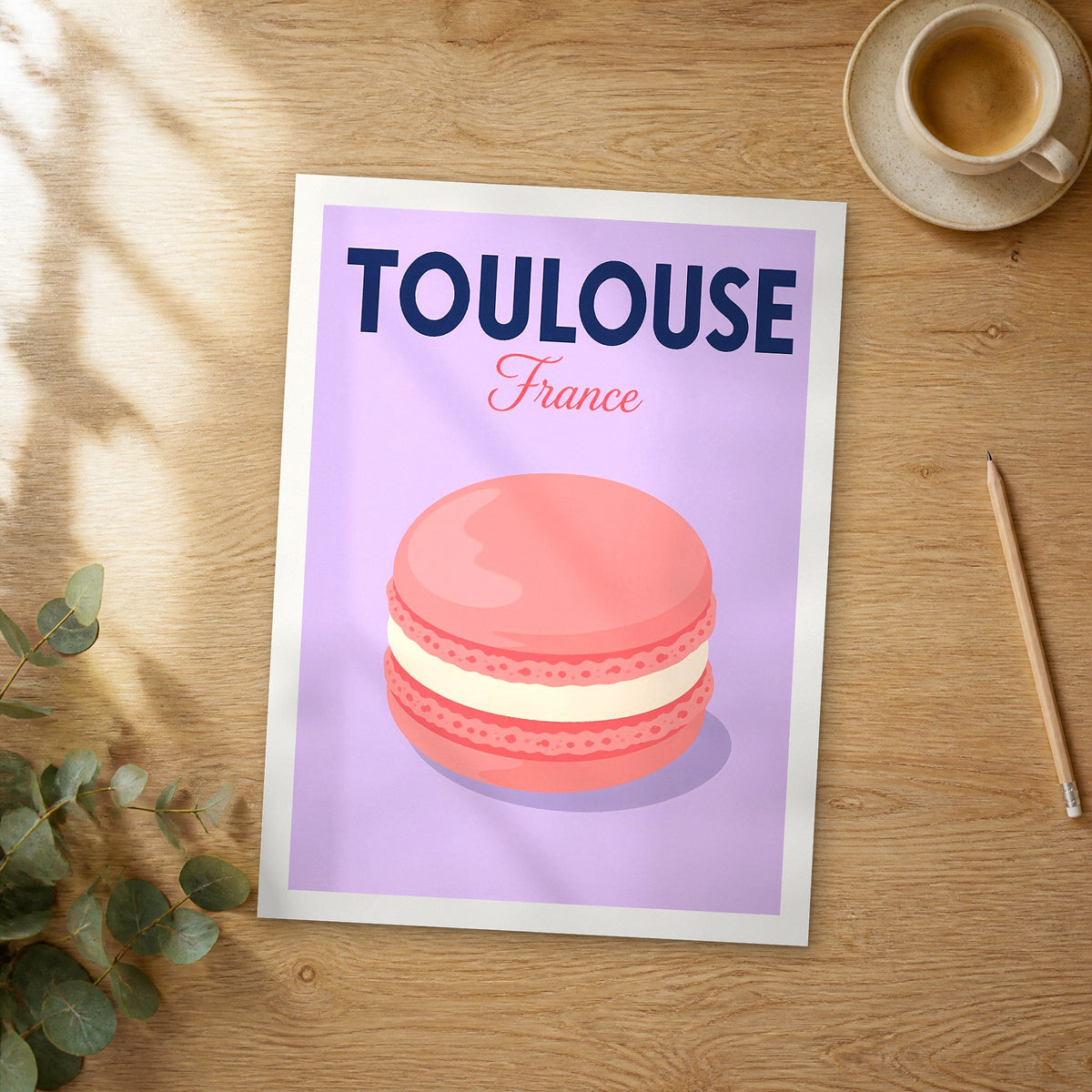 Unframed Toulouse pop art travel poster on a wooden table