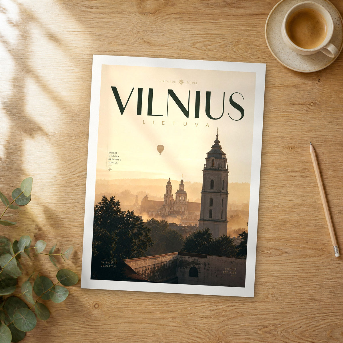 Unframed Vilnius bold typography travel poster on a wooden table