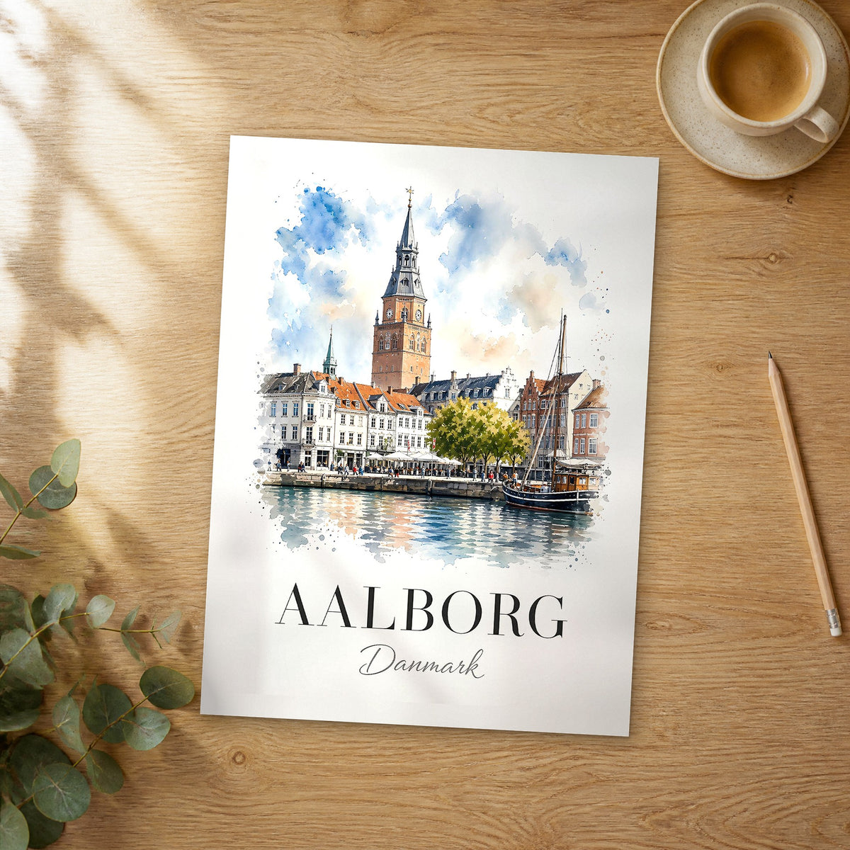 Unframed Aalborg watercolor travel poster on a wooden table