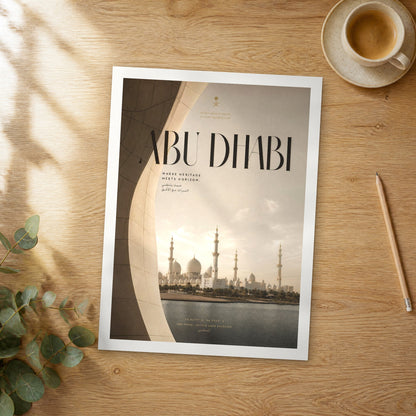 Unframed Abu Dhabi Sheikh Zayed Grand Mosque bold typography travel poster on a wooden table