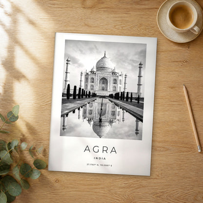 Unframed Agra black and white travel poster on a wooden table
