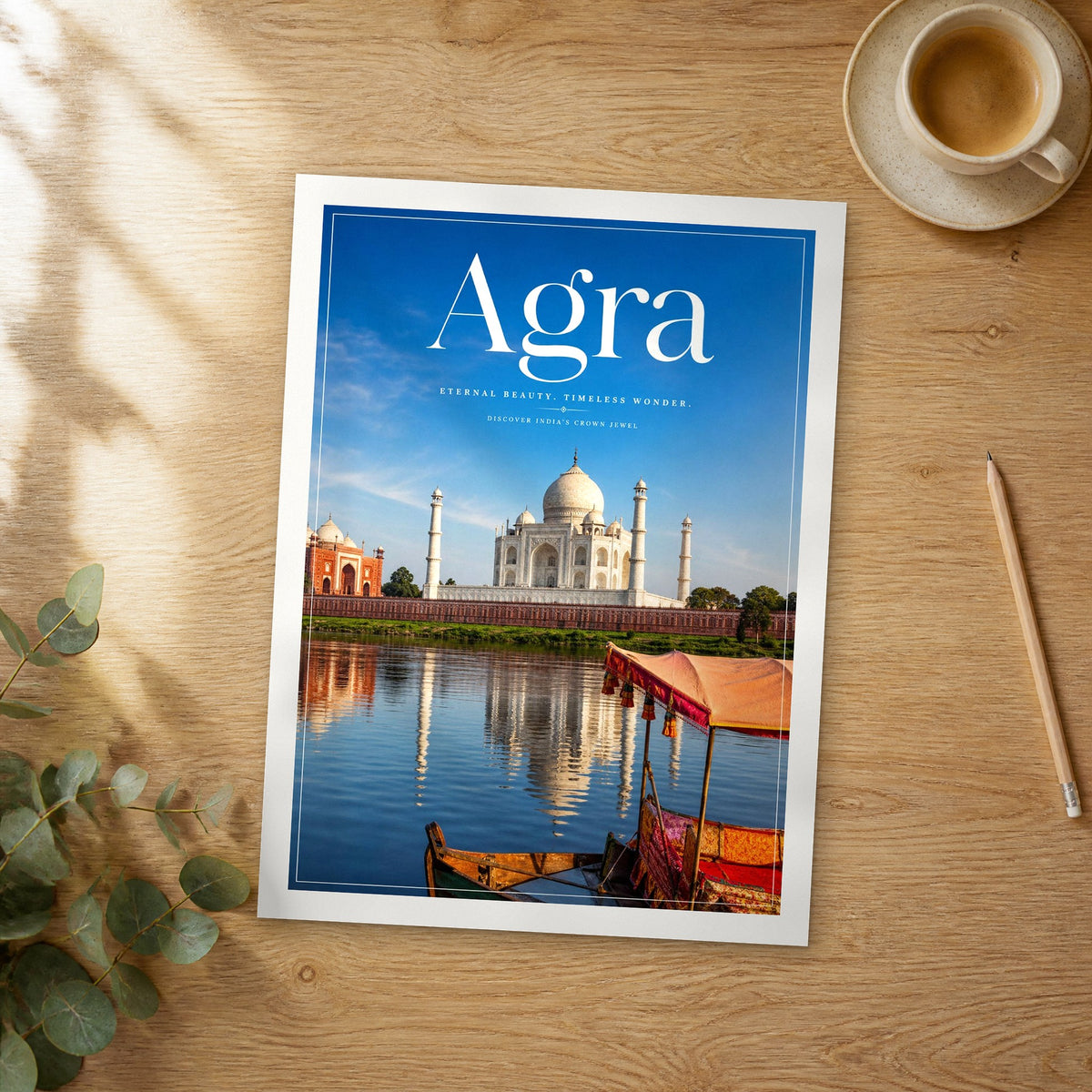 Unframed Agra editorial travel poster on a wooden table