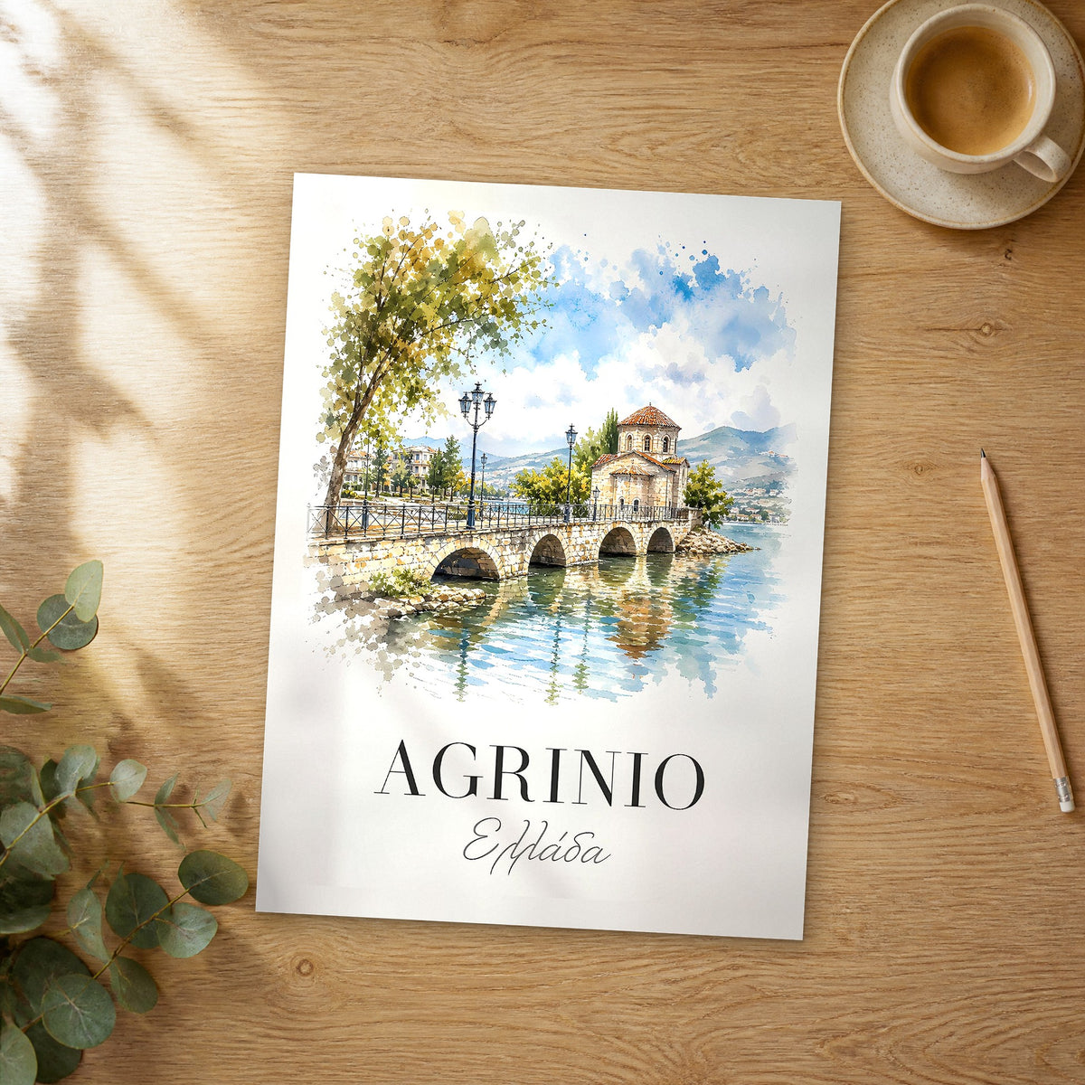 Unframed Agrinio watercolor travel poster on a wooden table