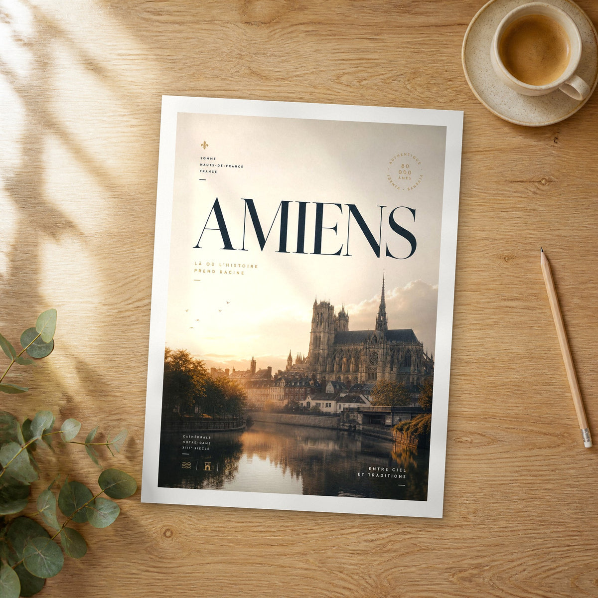 Unframed Amiens bold typography travel poster on a wooden table