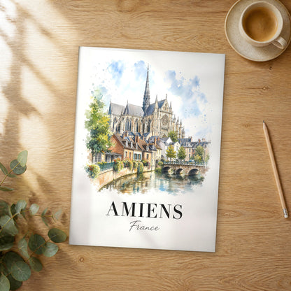 Unframed Amiens watercolor travel poster on a wooden table