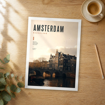 Unframed Amsterdam Canal Bridge Sunset bold typography travel poster on a wooden table
