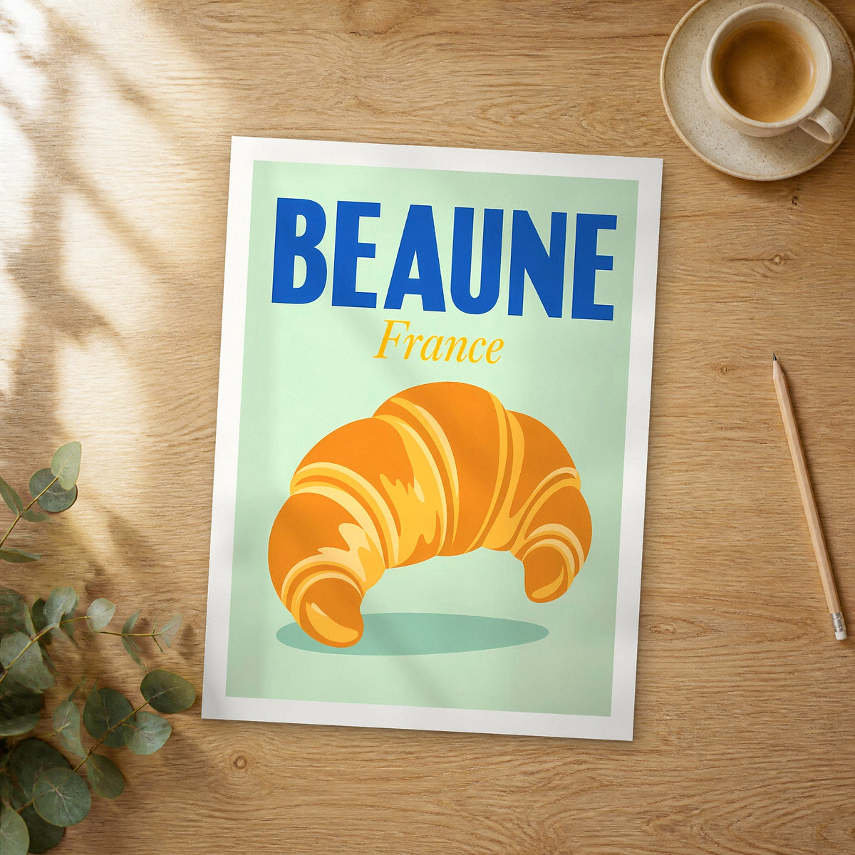 Unframed Beaune pop art travel poster on a wooden table