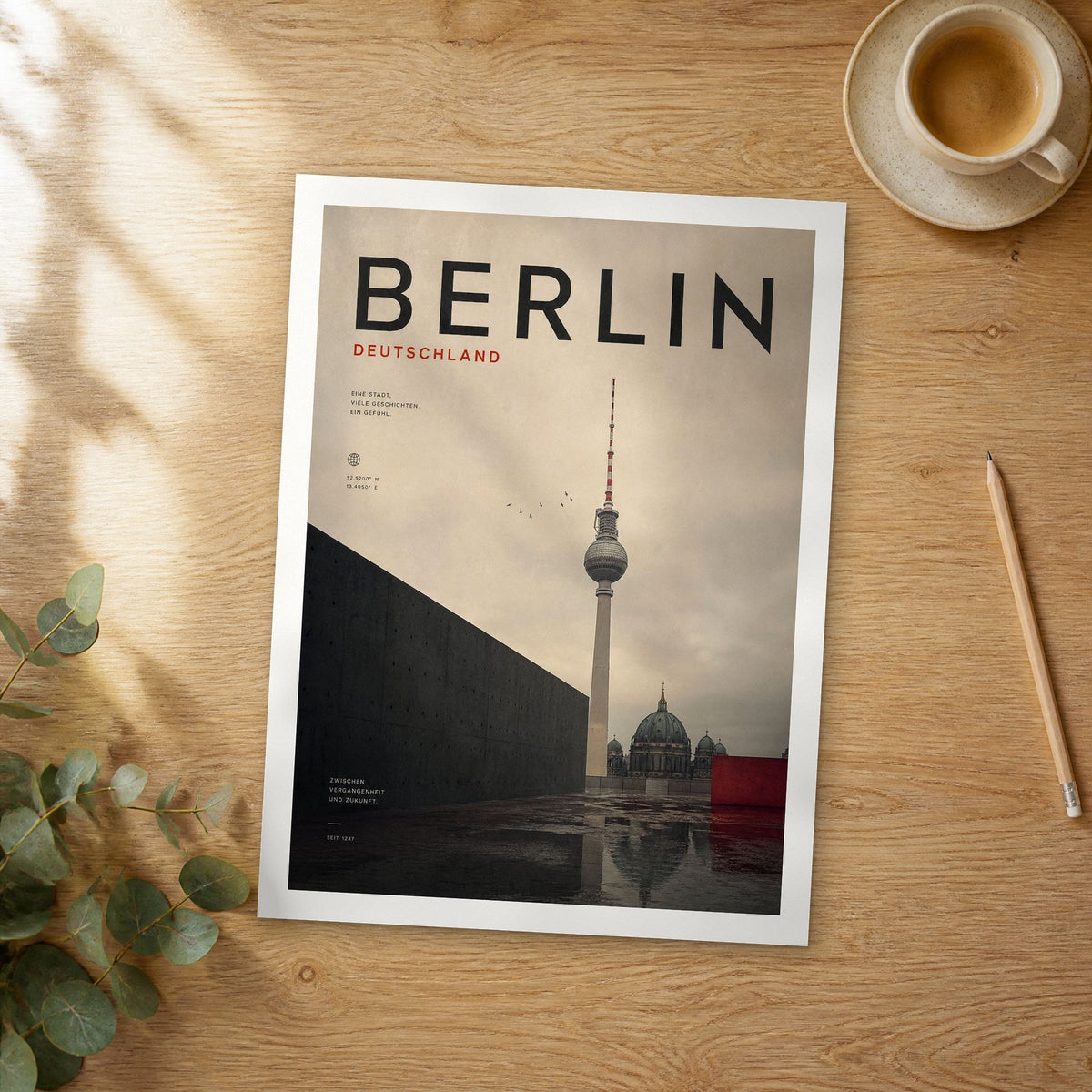 Unframed Berlin TV Tower Reflection bold typography travel poster on a wooden table