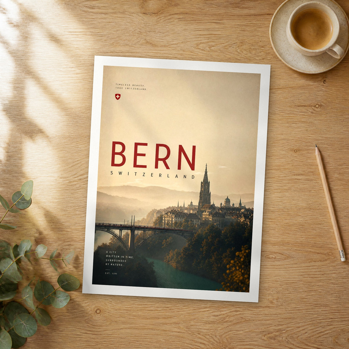 Unframed Bern bold typography travel poster on a wooden table