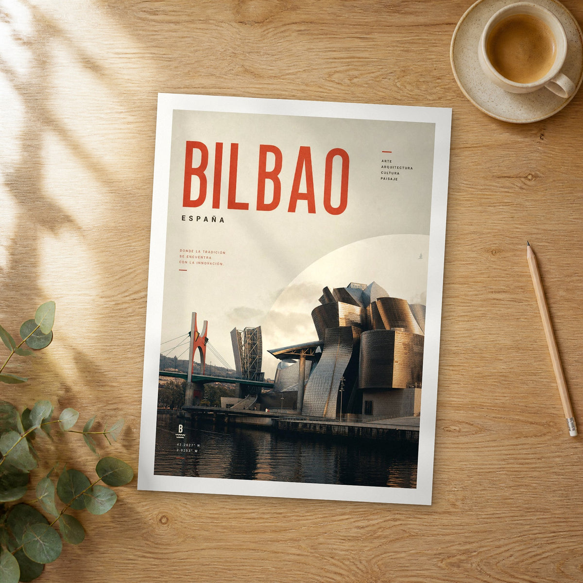 Unframed Bilbao Guggenheim Museum Riverside bold typography travel poster on a wooden table