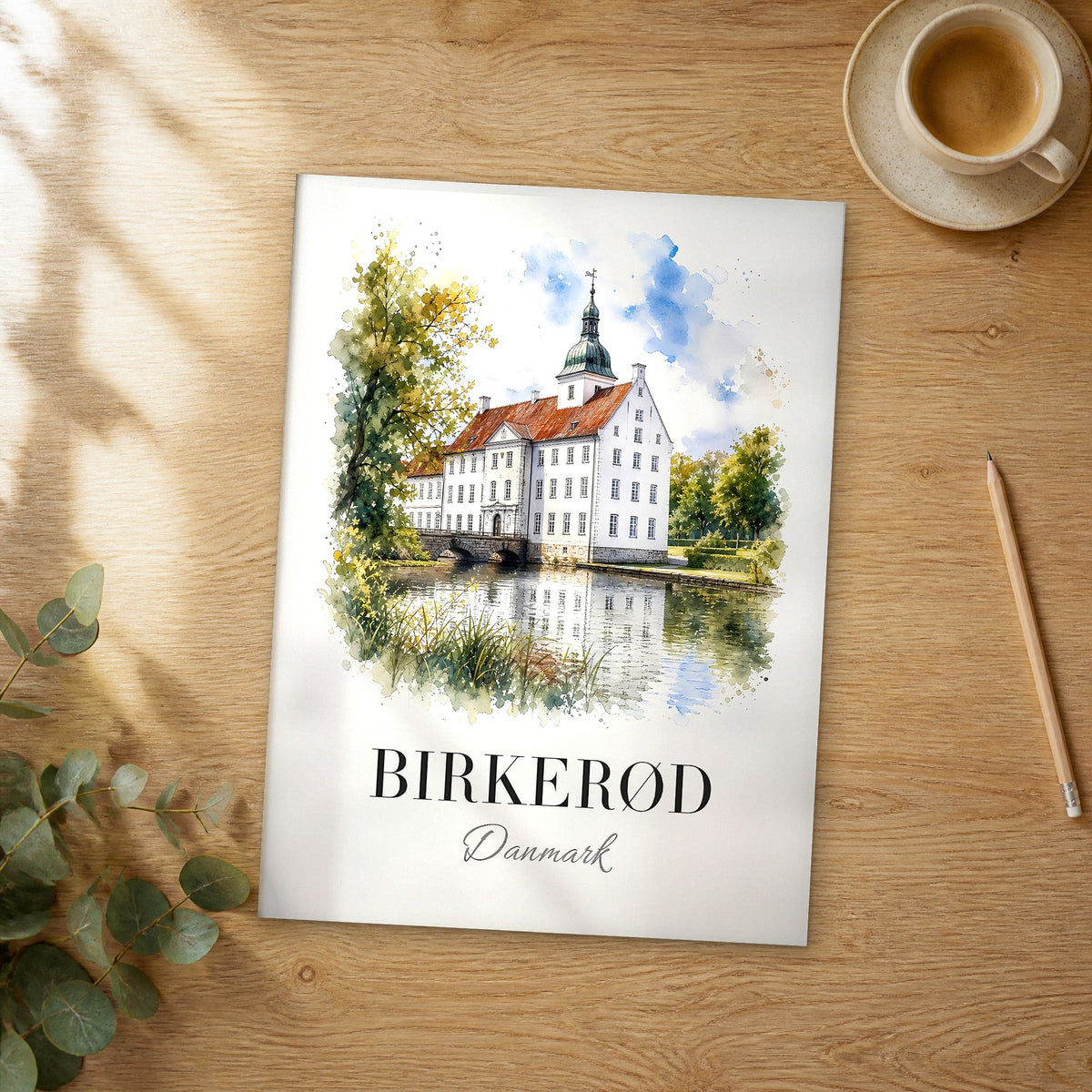 Unframed Birkerød watercolor travel poster on a wooden table