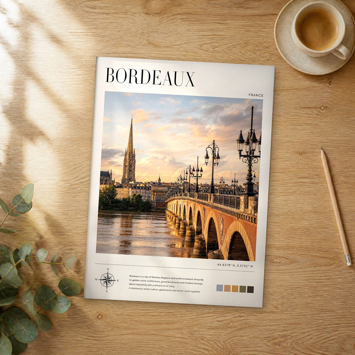 Unframed Bordeaux modern photography travel poster on a wooden table