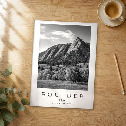 Unframed Boulder black and white travel poster on a wooden table
