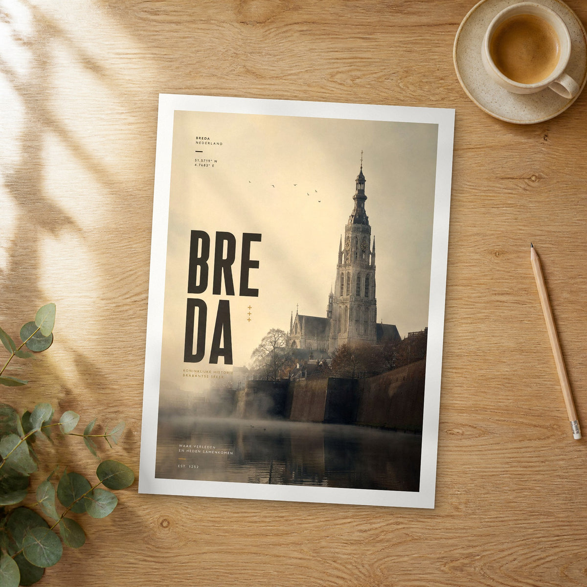 Unframed Breda bold typography travel poster on a wooden table