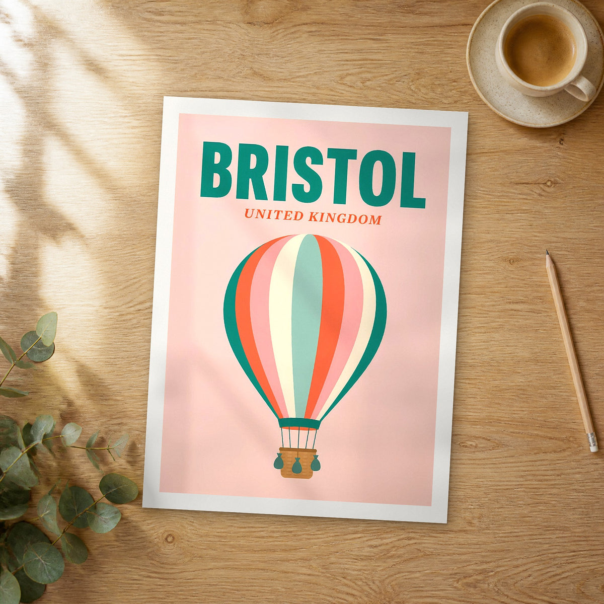 Unframed Bristol pop art travel poster on a wooden table