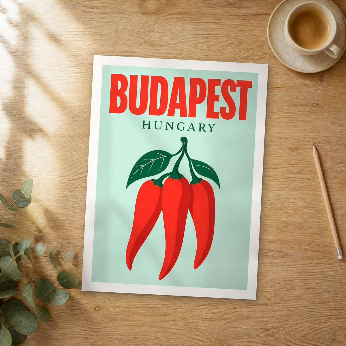 Unframed Budapest pop art travel poster on a wooden table